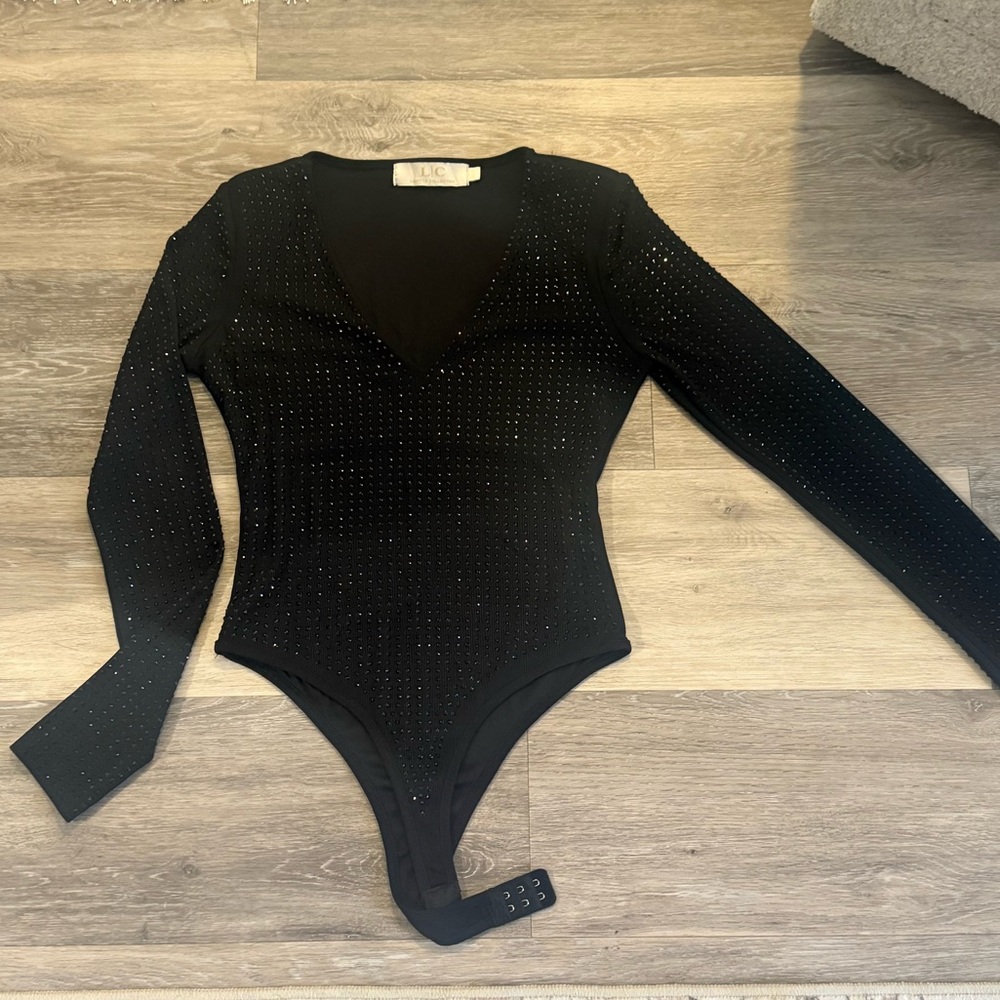 Elegant Black V-Neck Sweater with Sparkling Details
